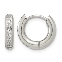 A pair of silver hoop earrings with a polished finish, one displaying a row of round brilliant-cut diamonds along the inner surface.