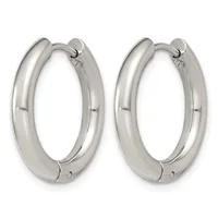 A pair of polished silver-toned chunky hoop earrings with a hinged closure, shown against a white background.