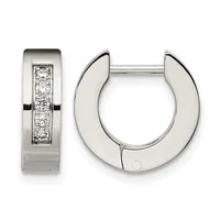 A pair of polished silver huggie earrings with channel-set round diamonds arranged in a vertical line on the front surface, shown from front and side views.