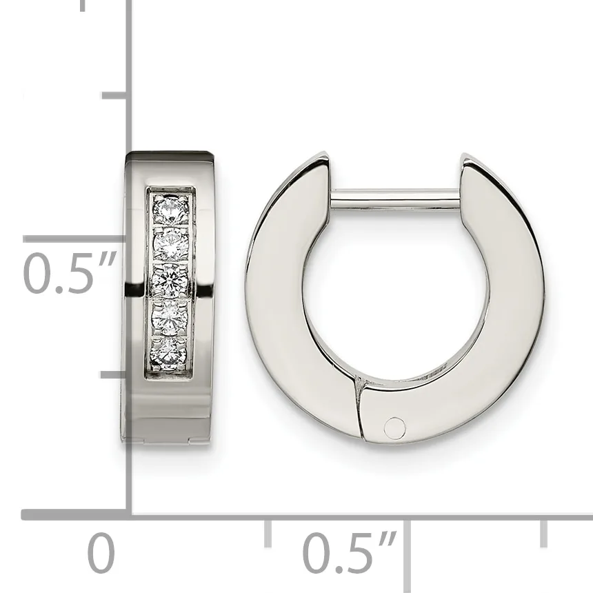 Pair of polished silver huggie earrings with channel-set round diamonds on the front face, shown with measurement scale indicating 0.5 inch width.