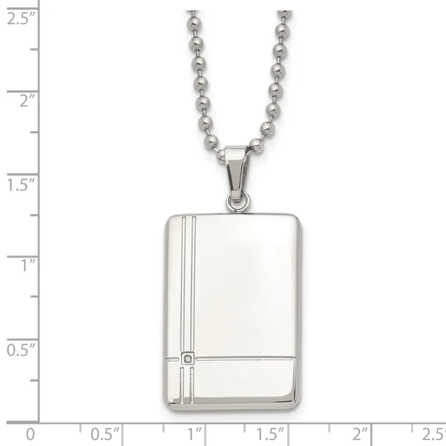 Silver-toned rectangular pendant with vertical line details and a small square stone accent, suspended from a ball chain, shown against a ruler measuring approximately 1.3 inches tall.