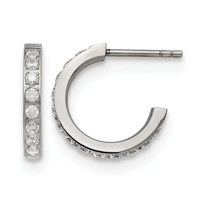 A pair of silver hoop earrings with channel-set round cubic zirconia stones along the front, shown from the front and side view.