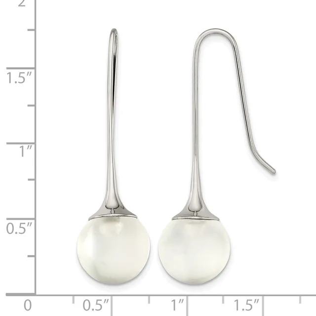 Two silver earrings with white pearl spheres suspended from curved hooks, displayed against a measurement scale showing approximately 2 inches in total length.