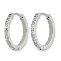 A pair of silver hoop earrings with diamond pavé settings along the outer edges and hinged closures.