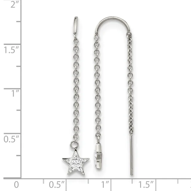 Two silver chain earrings displayed on a measurement scale: one with a star pendant set with crystals on a leverback, one threaded through a hoop with a bar end.