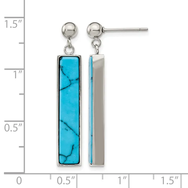 A pair of silver dangle earrings with round ball posts featuring rectangular turquoise stone pendants with black veining, shown against a measurement scale.
