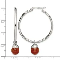 Silver hoop earrings with red stone ball drops, displayed next to a measurement scale showing approximately 2 inches in length.