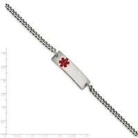 A stainless steel curb chain bracelet with a rectangular medical alert tag featuring a red star of life symbol, displayed against a measurement scale.