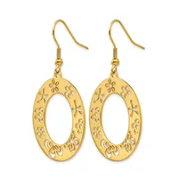 A pair of gold-toned oval drop earrings with ornate floral cutout designs throughout, suspended from fish hook wires.
