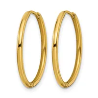 A pair of polished gold hoop earrings with a smooth, rounded oval shape and small hinged closures at the top.