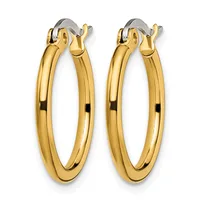 A pair of polished gold-toned hoop earrings with oval shapes and hinged closures, displayed against a white background.