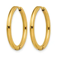 A pair of polished gold-toned chunky oval hoop earrings with a hollow tube design and small posts with backs.