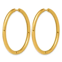 A pair of polished gold hoop earrings with a smooth, rounded surface and hinged closures, displayed against a white background.
