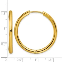 A pair of gold hoop earrings with a polished finish, displayed next to a ruler showing them to be approximately 1.5 inches in diameter.