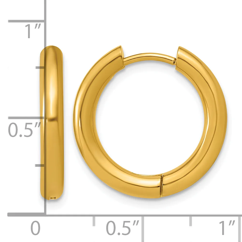 A pair of polished gold-toned chunky tubular hoop earrings with a hinged closure, shown with measurement scale indicating approximately one inch in diameter and half inch in width.