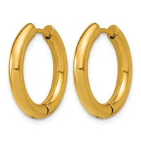 A pair of polished gold hoop earrings with a chunky, rounded profile and hinged posts, displayed side by side against a white background.