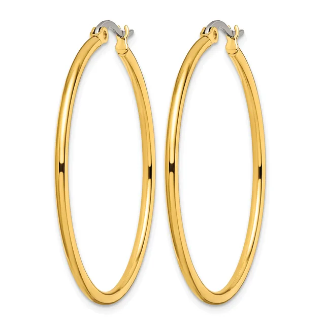 A pair of polished gold-toned hoop earrings with a smooth, rounded profile and hinged closures, displayed against a white background.