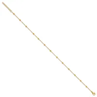 Delicate gold-toned chain bracelet with small spherical beads spaced evenly throughout, featuring an adjustable clasp at the top.