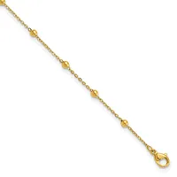 A gold-toned chain bracelet with evenly spaced spherical beads along its length and a lobster claw clasp at one end.