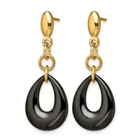 Pair of gold-toned stud earrings with polished black teardrop-shaped pendants hanging from circular connectors.