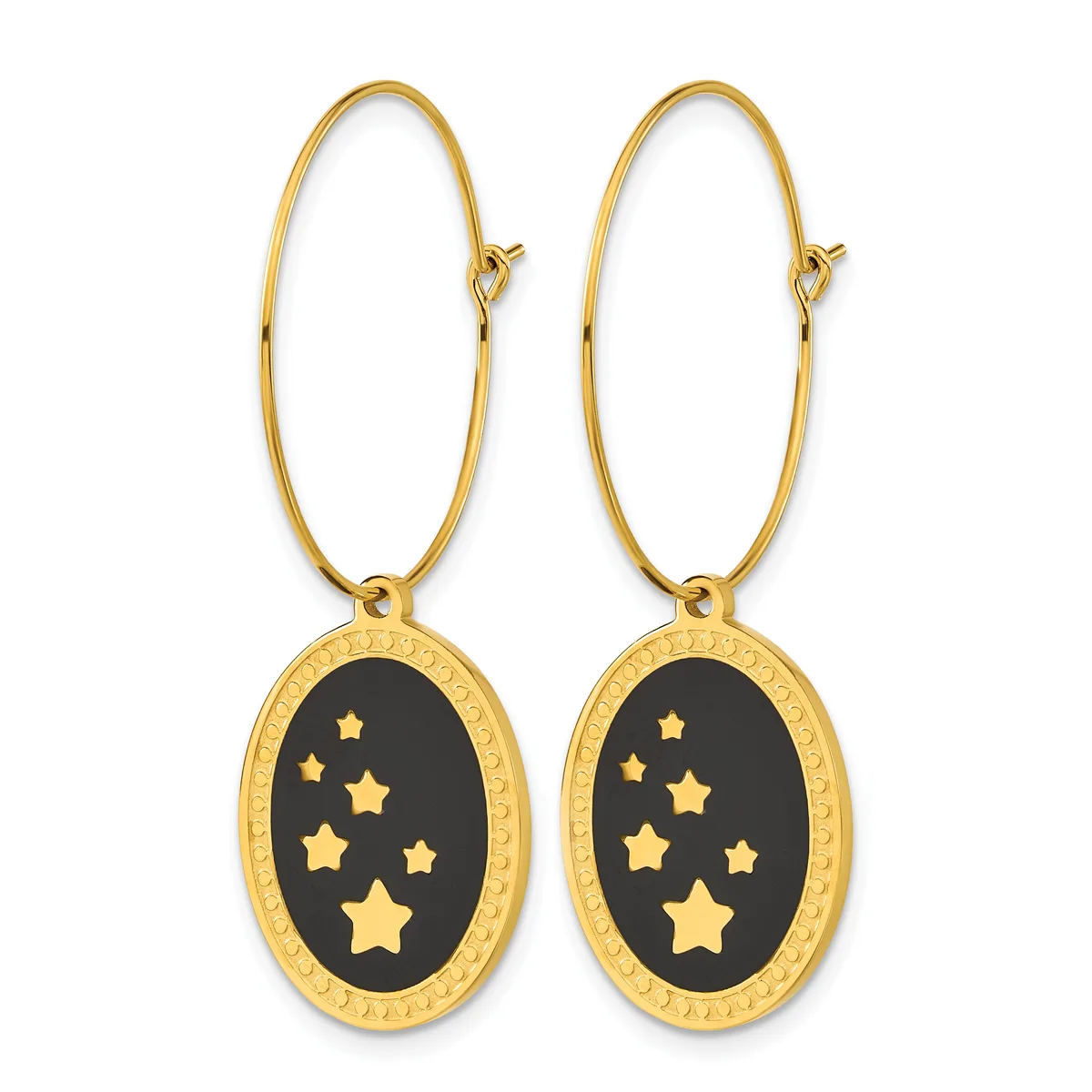 Pair of gold-toned oval hoop earrings with black enamel pendant charms decorated with gold stars.