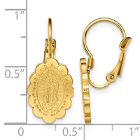 Gold-toned leverback earrings with scalloped oval medallion charms featuring a religious figure in relief, displayed against a measurement scale.