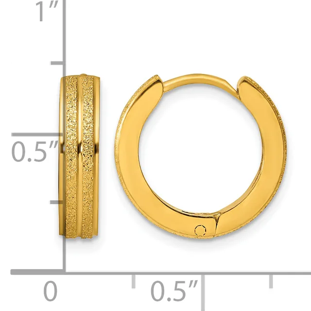 A pair of gold-colored hoop earrings with textured surfaces, shown front and side view with measurement scale indicating approximately one inch in height and half inch in width.
