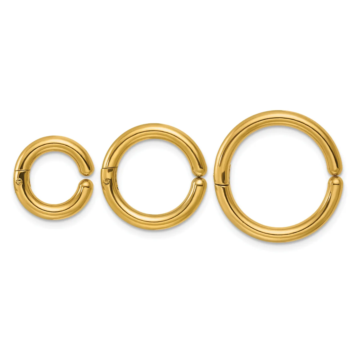 Three gold-colored hinged segment rings in increasing sizes arranged in a row against a white background.