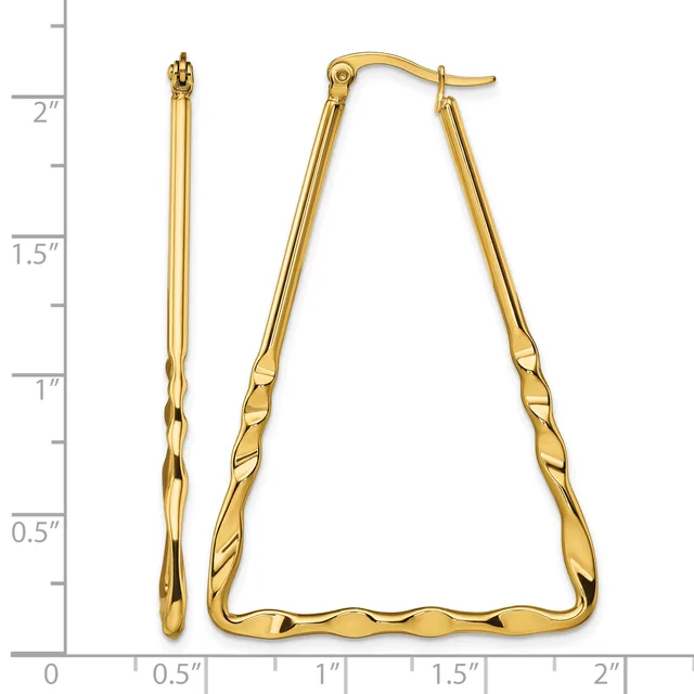 A pair of gold-toned trapezoid-shaped hoop earrings with twisted texture on the lower portion, displayed against a ruler showing approximately two inches in height.
