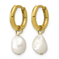 A pair of gold hoop earrings with white pearl drops hanging from the bottom.