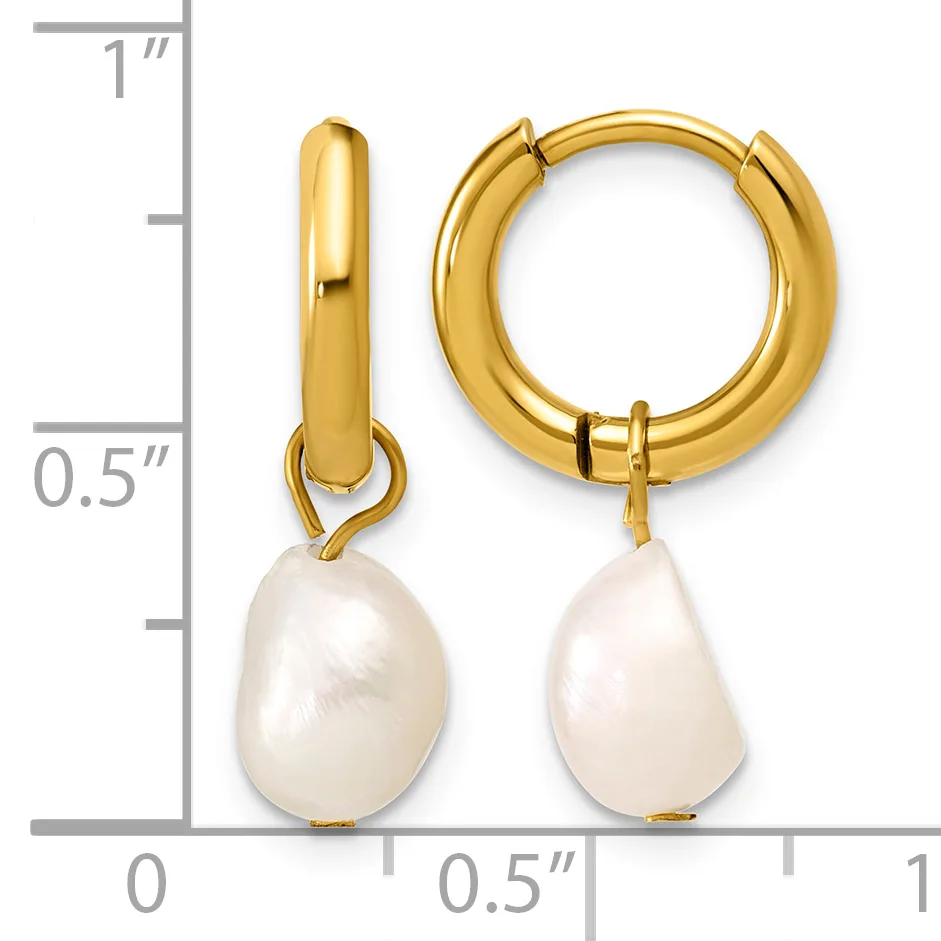 Gold-tone huggie hoop earrings with white pearl drop charms, shown next to a ruler indicating approximately one inch in length.