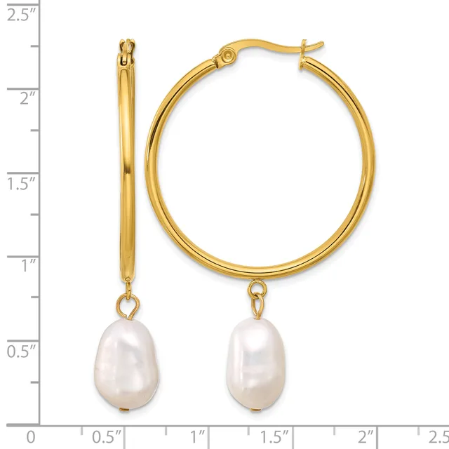 Gold-tone hoop earrings with freshwater pearl drops, shown next to a ruler measuring approximately 2.25 inches in length.