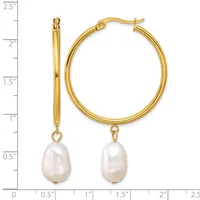 Gold-tone hoop earrings with freshwater pearl drops, shown next to a ruler measuring approximately 2.25 inches in length.