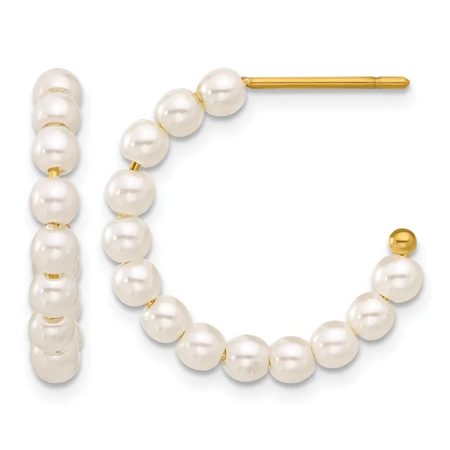 Gold hoop earrings with white pearl accents arranged in a curved design, displayed against a white background.
