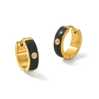 A pair of gold hoop earrings with black enamel bands and small diamond accents, displayed at different angles.