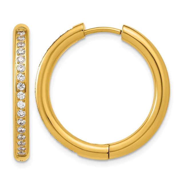 A pair of gold hoop earrings with diamond accents along the inner surface, shown from the front and side view.