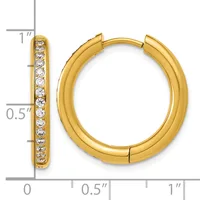 Gold hoop earrings with diamond accents along the inner edge, shown against a ruler displaying dimensions of approximately one inch in height and half inch in width.