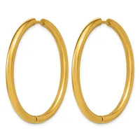 A pair of polished gold-colored hoop earrings with a smooth, rounded tubular design and hinged closures.