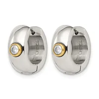A pair of polished silver chunky hoop earrings with gold-rimmed bezels set with round clear crystals, shown from front and back views.