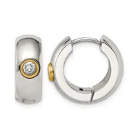 A pair of polished silver hoop earrings with gold-toned bezels set with round clear gemstones, shown from front and side views.