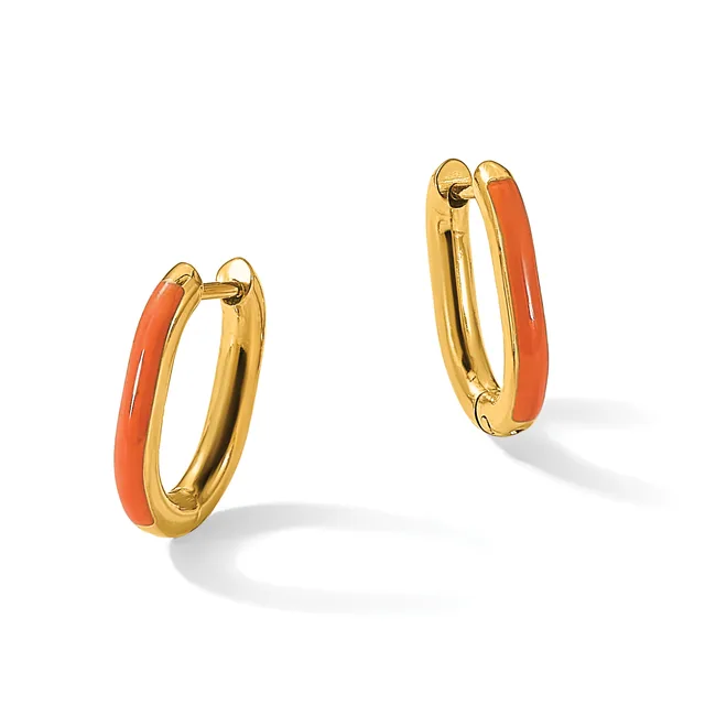 A pair of gold hoop earrings with red enamel inlay, shown from two angles against a white background.
