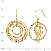 Two gold spiral dangle earrings with textured surfaces and fish hook closures, displayed against a measurement ruler showing approximately 2.5 inches in length.