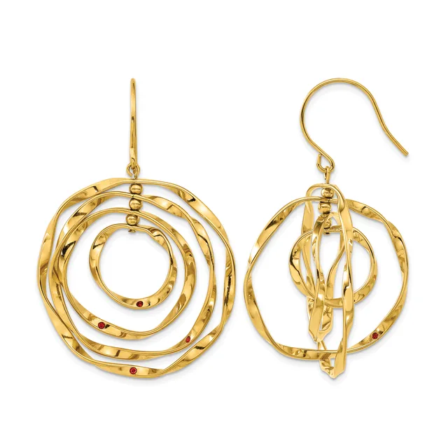 A pair of gold spiral dangle earrings with textured surfaces and small red stone accents, shown from front and back views.