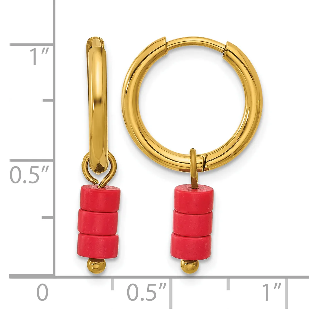 Gold-toned hoop earrings with red cylindrical bead charms, displayed next to a ruler showing approximately one inch in length.