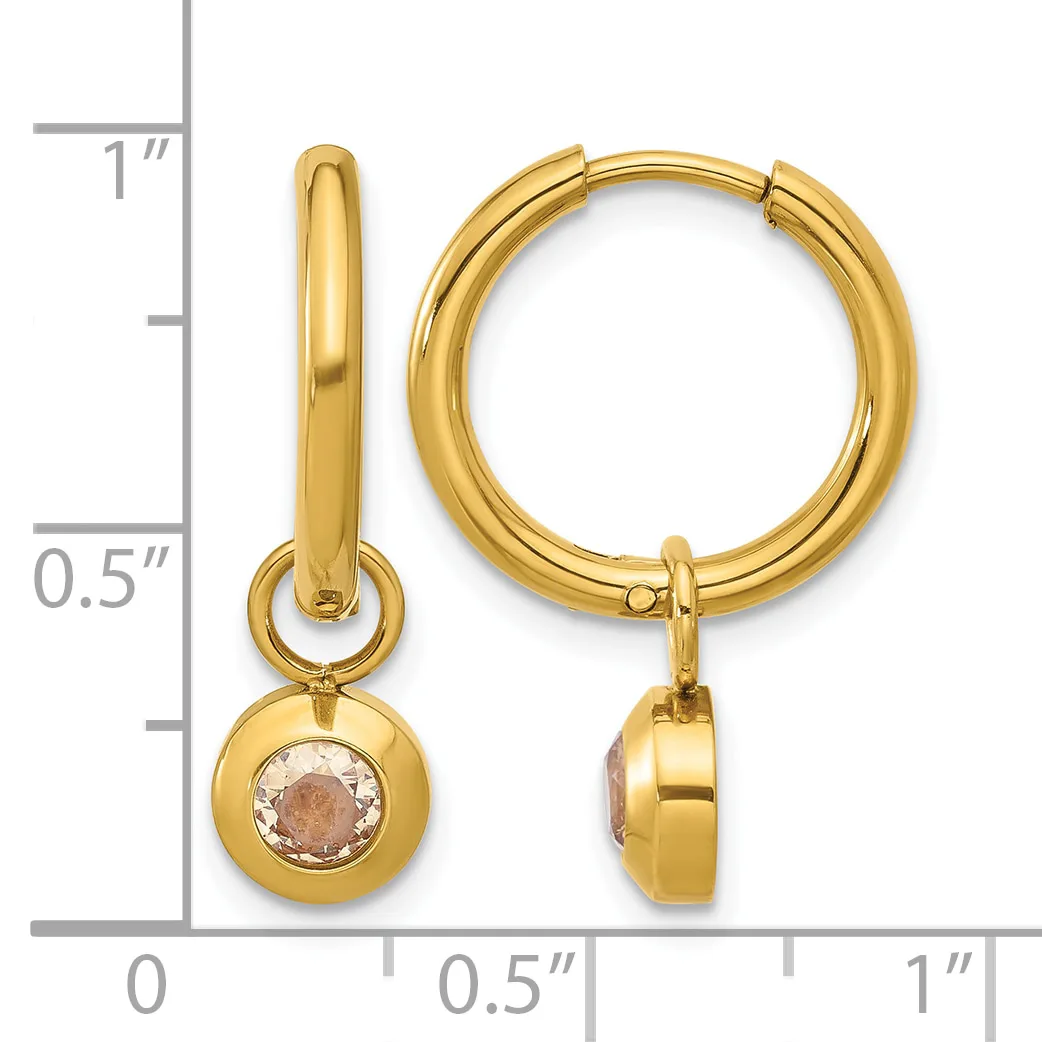 Gold-tone hoop earrings with dangling round charms set with morganite stones, displayed next to a measurement ruler.