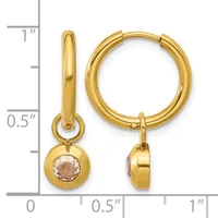 Gold-tone hoop earrings with dangling round charms set with morganite stones, displayed next to a measurement ruler.