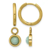 Four gold jewelry pieces displayed: a polished gold huggie hoop earring shown from the side, a larger matching hoop earring, and a detachable pendant charm with a round pale green stone in a gold bezel, shown from front and side views.