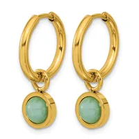 A pair of gold hoop earrings with oval green jade stone pendants hanging from the bottom.