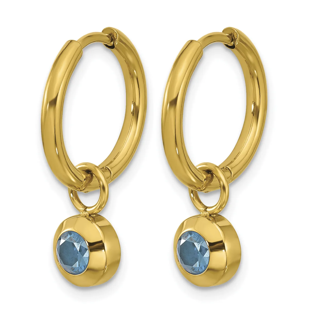 A pair of gold hoop earrings with blue gemstone charms hanging from the bottom.