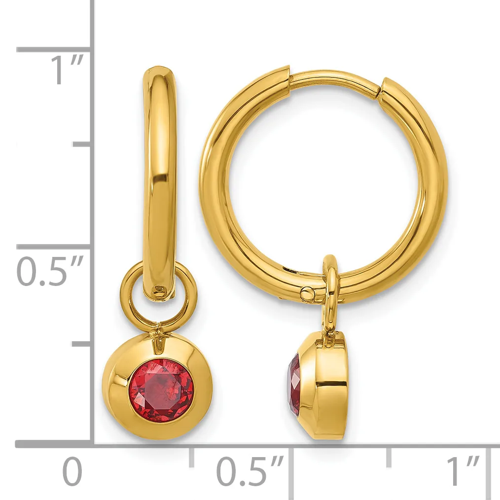 Gold hoop earrings with red gemstone charms hanging from the hoops, shown next to a measurement scale.